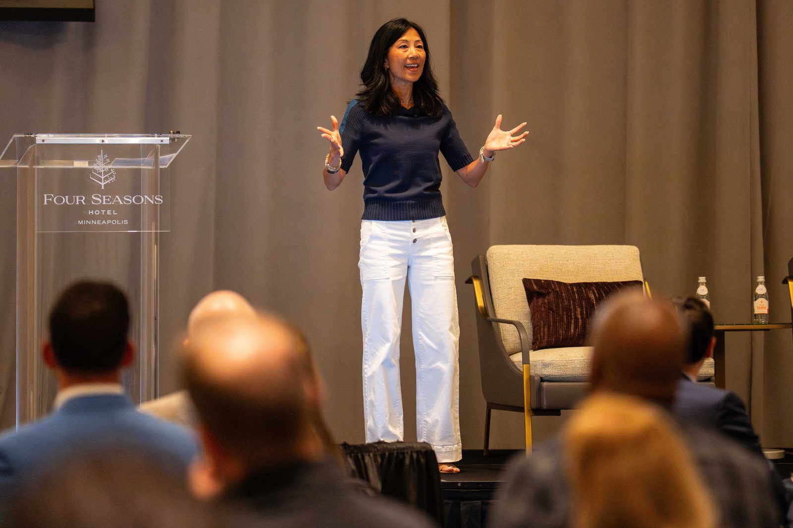 Cathy Winter speaking on stage